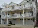 217 EAST MAPLE AVENUE - Three bedroom, two bath condo offers full kitchen with range, icemaker, fridge, microwave, dishwasher, disposal. Sleeps 6; 2 queen, 2 twin. Amenities include central air/heat, balcony, outside shower, 1 car garage, and 1 car driveway. Close to everything! 