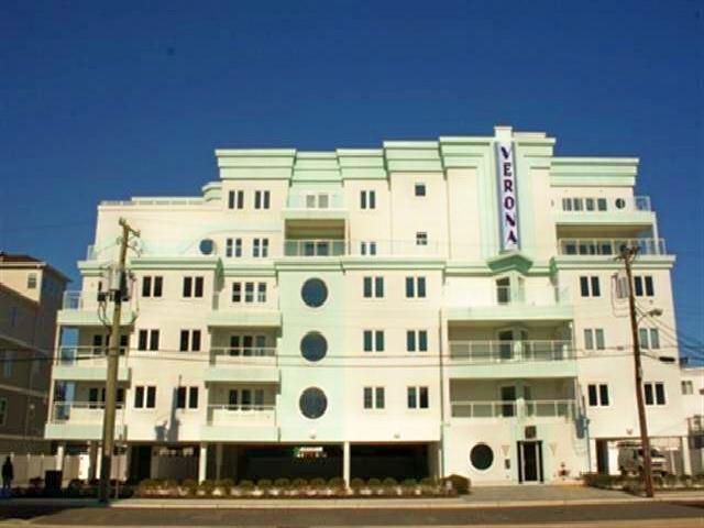 VERONA CONDOMINIUMS - Beachblock at 407 E Monterey in Wildwood Crest - 3 bedroom, 2 bath luxury vacation home located beachblock at the prestigious Verona Condominiums. Amenities include: central a/c, washer/dryer, secured entrance, outside shower, rooftop pool w/beautiful ocean view; assigned off street parking for 2 cars; secure elevator. Home offers a fully equipped kitchen with range, cook-top, icemaker, fridge, microwave, disposal, dishwasher, toaster and coffeemaker. Sleeps 8-10; 2 queen beds and full bed, additional sleeping on sectional sofa. 