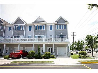 4117 HUDSON AVENUE - Four bedroom, 3.5 bath townhouse style home. Located on the bayside of the island this get-away-from-it all property boasts all of the comforts of home. Spacious and well appointed. Kitchen has fridge, range, microwave, dishwasher, disposal, toaster, blender and coffeemaker. Bedding includes: queen, 4 full, and one twin. 2 car off street parking, balcony, central a/c, washer/dryer, and wifi internet. 